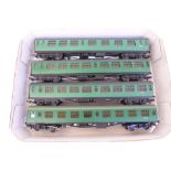 Four Bachmann OO gauge green model rail carriages