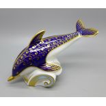 A Royal Crown Derby dolphin paperweight with gold stopper