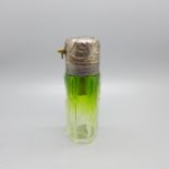 An electro plated Art Nouveau atomiser scent bottle with green shaded glass body with sculpted