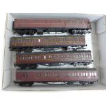 Four Airfix OO gauge maroon model rail carriages