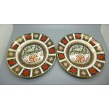 A pair of Royal Crown Derby limited edition Christmas plates