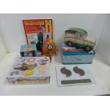 Wallace & Gromit collectables:- two tins, mug, Techno Trousers Haynes manual, Wensleydale Watcher