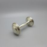 A sterling silver 'dumbbell' baby rattle, Empire Silver, USA, 23g