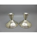 A pair of sterling silver weighted candle holders, Wallingford, USA, circa 1950-1960, 8cm