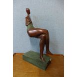 A Surrealist style bronze figure of a seated lady, 60cms h