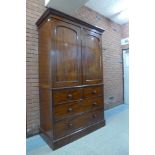 A Victorian mahogany linen press