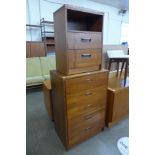 A teak chest of drawers and a teak bedside chest of drawers