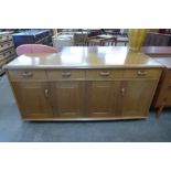 A Priory oak sideboard