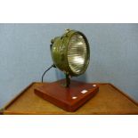 A Vintage green metal spotlight on stand