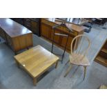 An Ercol Blonde elm coffee table, an Ercol chair and a beech gentleman's valet stand