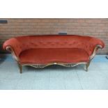 A French Louis XV style carved walnut and fabric upholstered settee