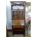 An Edward VII inlaid mahogany bureau bookcase