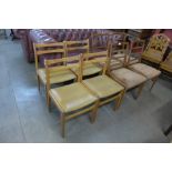 Two sets of four teak dining chairs