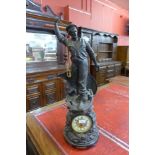 A large 19th Century spelter figural mantel clock, titled Cod Fishing, 75cms h