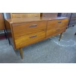 A small teak sideboard