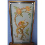 A large vintage Chinese dragon embroidery, framed