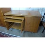 A McIntosh Tristor teak fold over cabinet/table