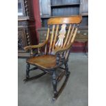 A Victorian elm and beech farmhouse rocking chair