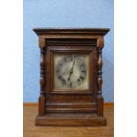 A 19th Century German carved oak mantel clock