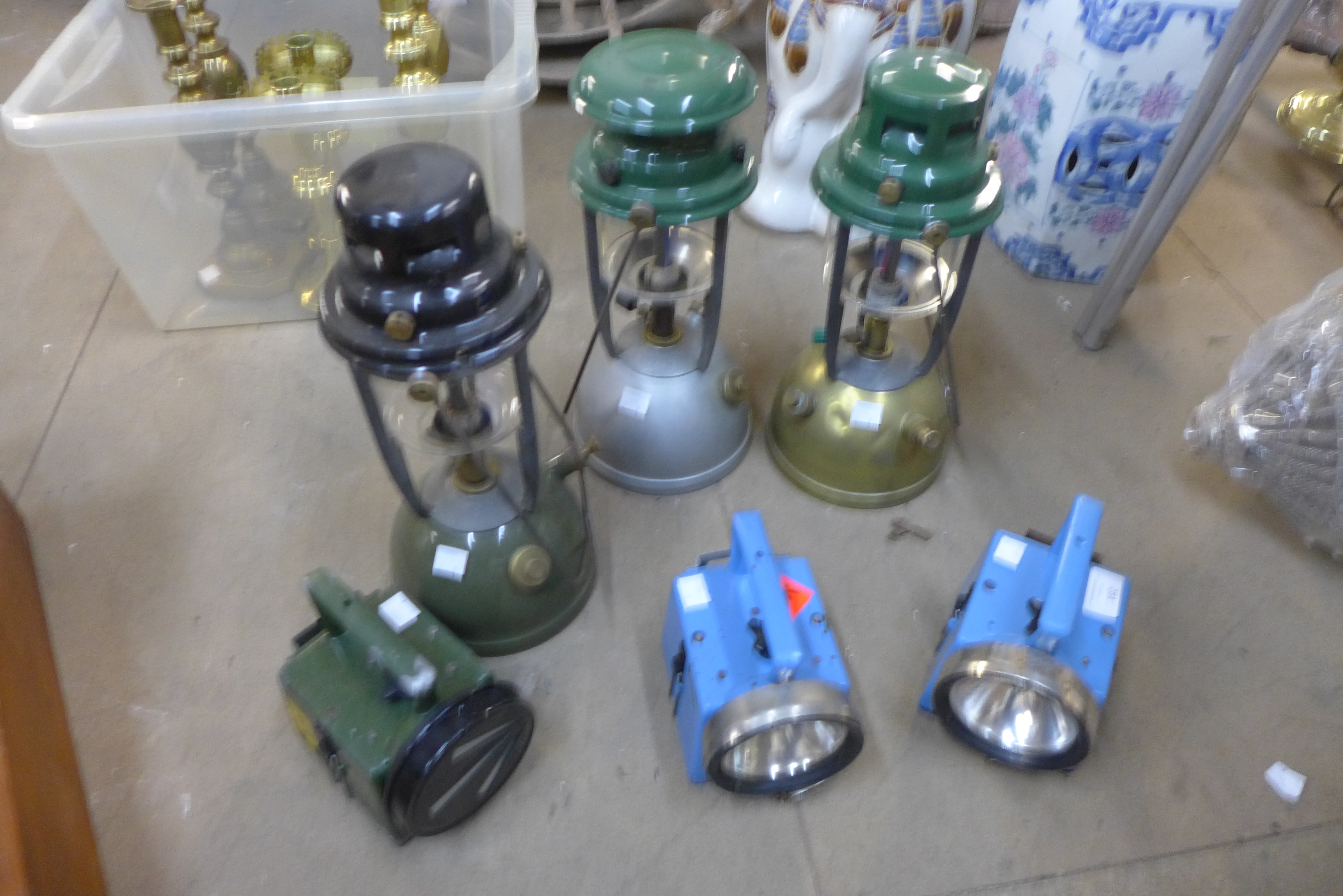 Three Tilley lamps and three miners lamps