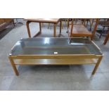 A Myer teak and glass topped coffee table