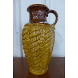 A large West German ochre and brown glazed porcelain vase