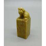 A vintage carved soapstone Chinese dog of foe seal/stamp