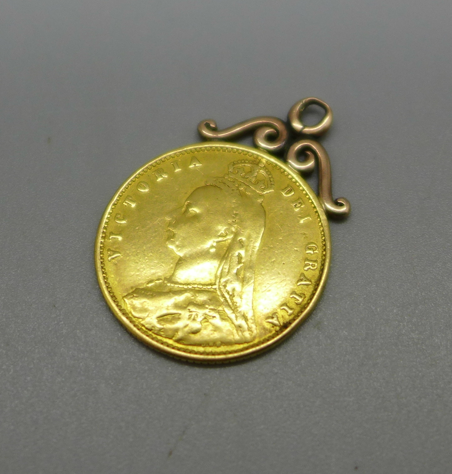 A Victorian 1887 half sovereign with pendant mount, Melbourne Mint, total weight 4.3g