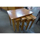 A Danish Poul Hundevad teak nest of tables