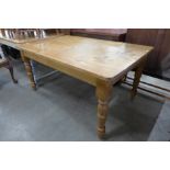 A pine farmhouse kitchen table