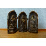 An oriental bronze triptych