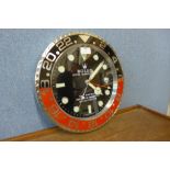 A Rolex style dealer's wall clock