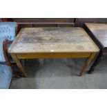 A Victorian oak kitchen table