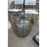 A vintage glass carboy