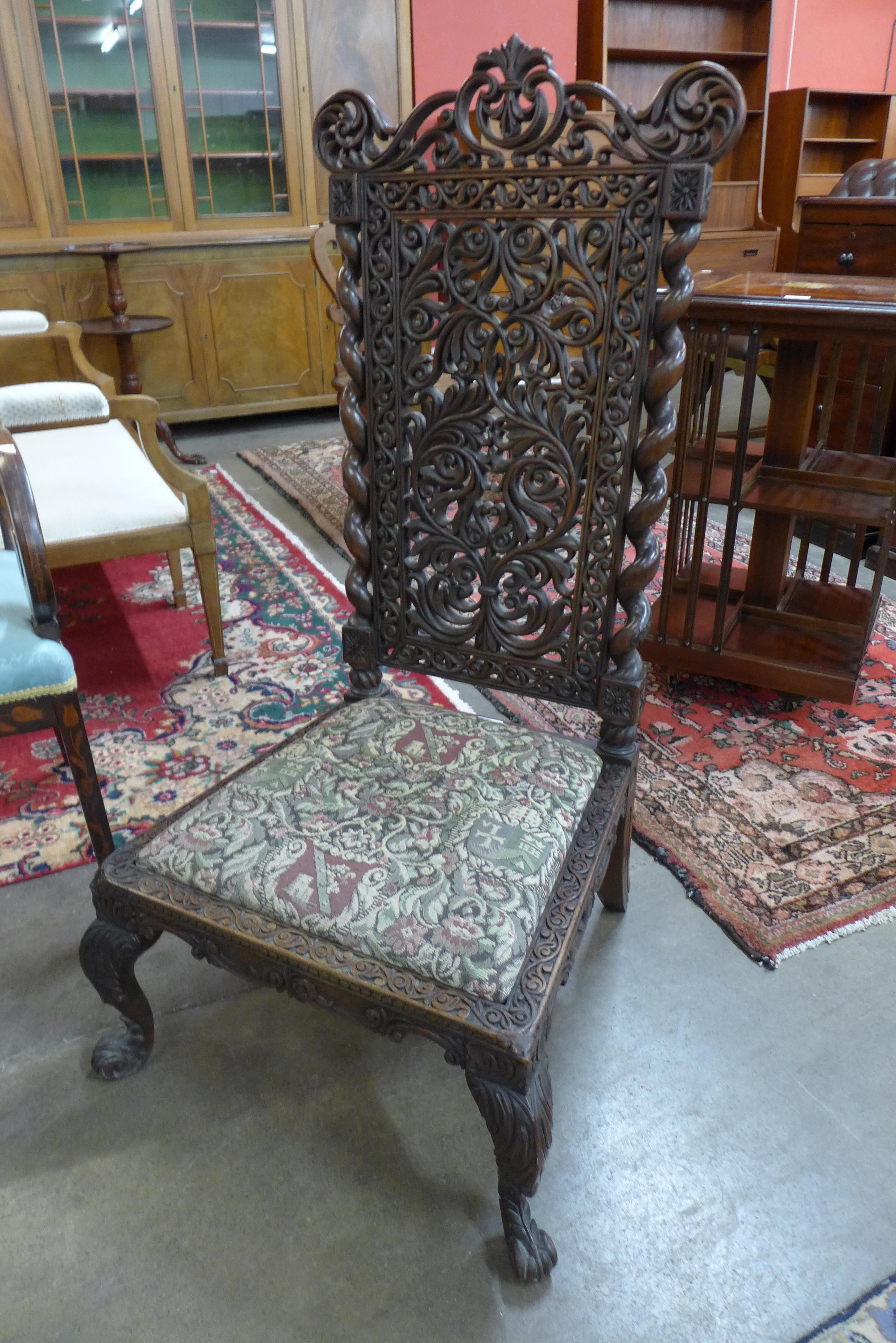 A 19th Century Anglo-Indian carved padouk wood side chair