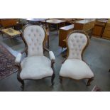 A pair of Victorian carved walnut and fabric upholstered lady's and gentleman's chairs