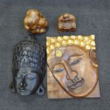 Four wooden items, two masks, a Buddha and a weeping Yogi