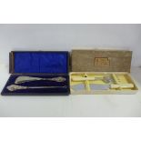 A cased set of silver mounted shoe horns, button hooks and boxed fish servers