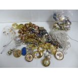 Assorted jewellery including necklaces, clip-on earrings, scarf clips and amber necklace