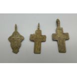 Three bronze crosses