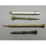 Four pencils including a hallmarked silver pencil holder, a/f