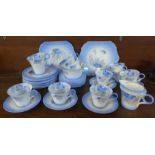 A Shelley Phlox tea service, twelve cups, saucers and side plates, cream jug, sugar and two larger