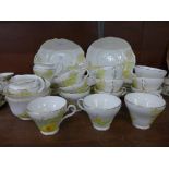 A Taylor & Kent Longton part tea set including twelve cups, eleven saucers and ten side plates