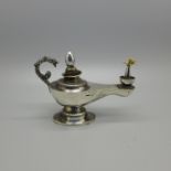 An Aladdin's lamp table lighter, continental control marks