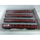 Four Bachmann 00 gauge model railway coaches