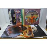 Fifteen assorted rock LP records including Bob Dylan, Queen, Rolling Stones, Canned Heat, etc.