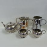 A Victorian silver plated two handled mug, a large plated mug and a Walker & Hall three piece plated