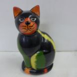 A Lorna Bailey large black cat moneybox, signed on the base, 23cm