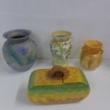 Four pieces of Art Deco china; Daneseby ware vase, Beswick vase, a Beswick biscuit barrel and one