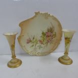 A matched pair of Royal Worcester vases and a Royal Worcester dish with pierced edge